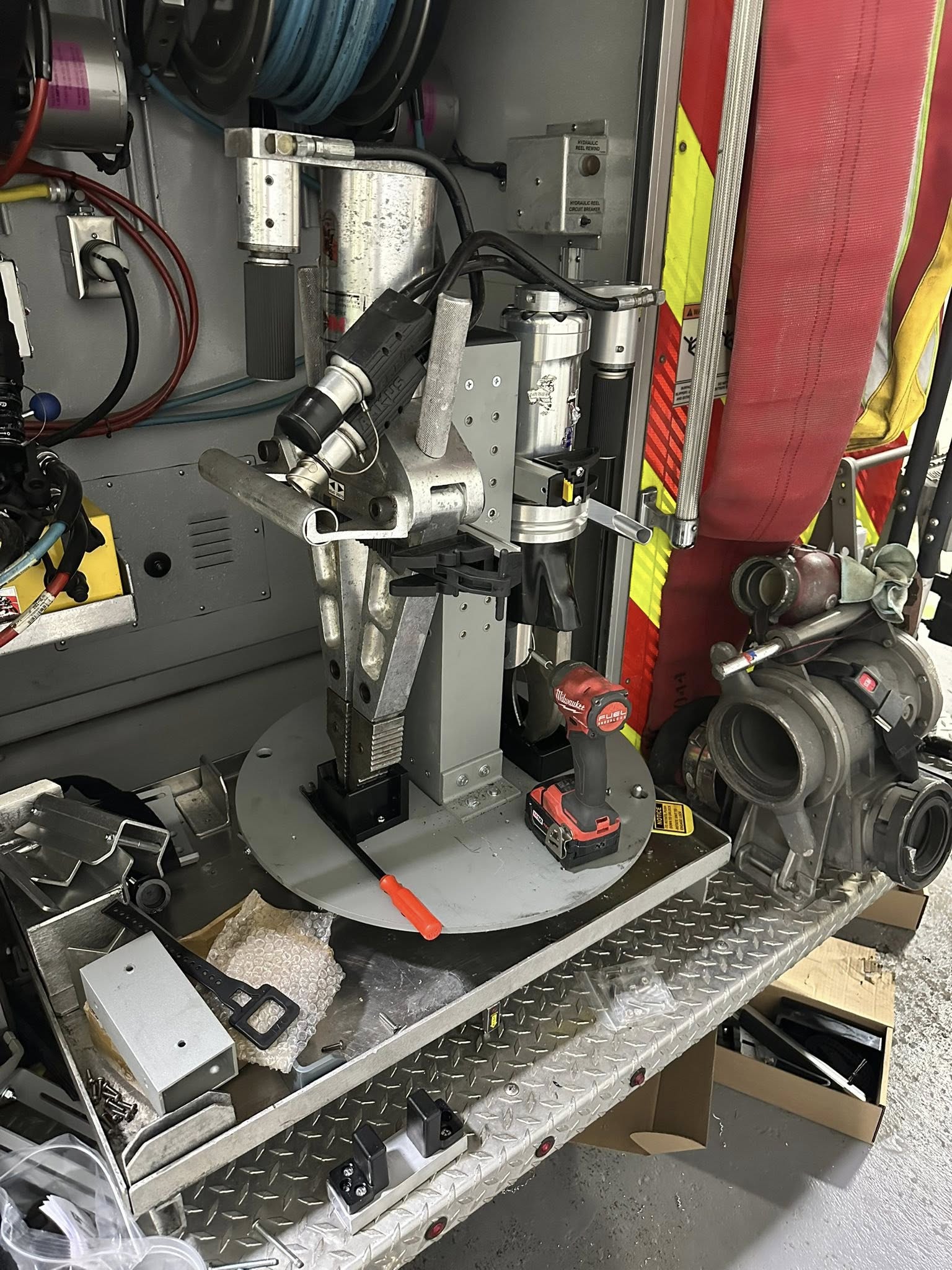 Lazy susan to hold tools custom fabrication for fire engine
